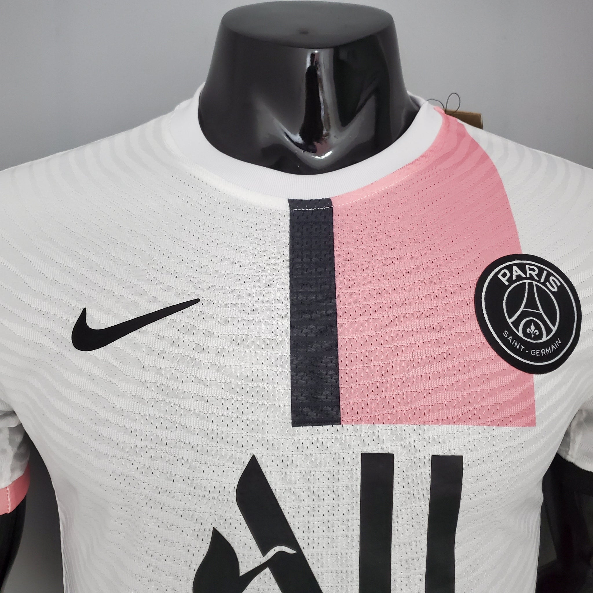 pink and white psg top